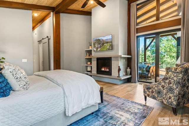 bedroom featuring beam ceiling, high vaulted ceiling, hardwood / wood-style floors, ceiling fan, and wooden ceiling