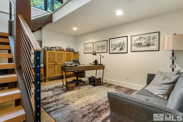 home office with light wood-type flooring