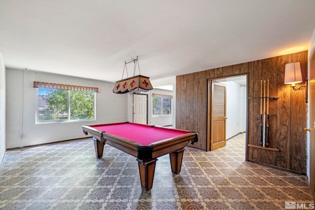 rec room with wooden walls and pool table