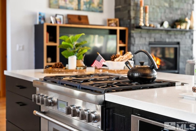 interior space featuring high end stainless steel range oven