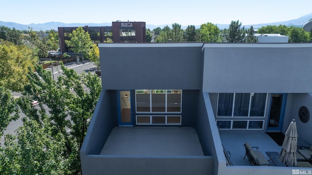 exterior space featuring a mountain view