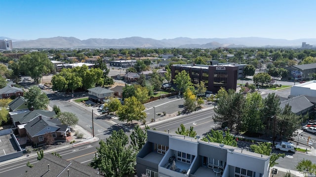 birds eye view of property featuring a mountain view