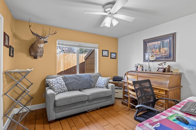 bedroom with ceiling fan and hardwood / wood-style floors