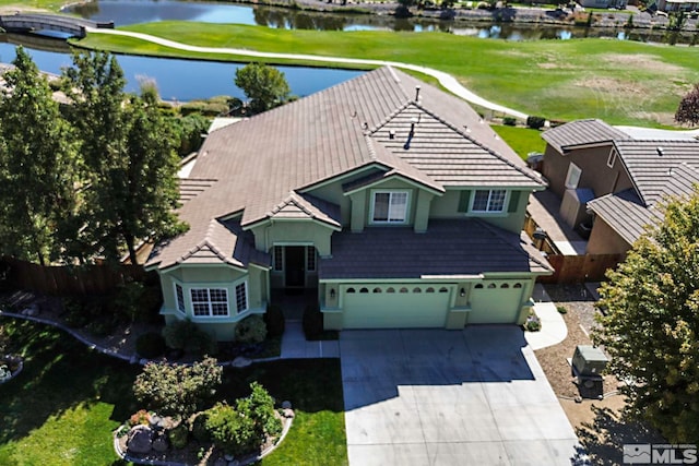 birds eye view of property featuring a water view