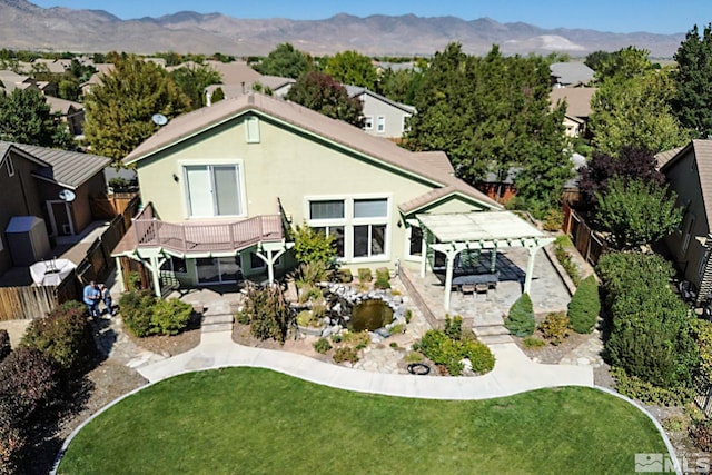 birds eye view of property with a mountain view