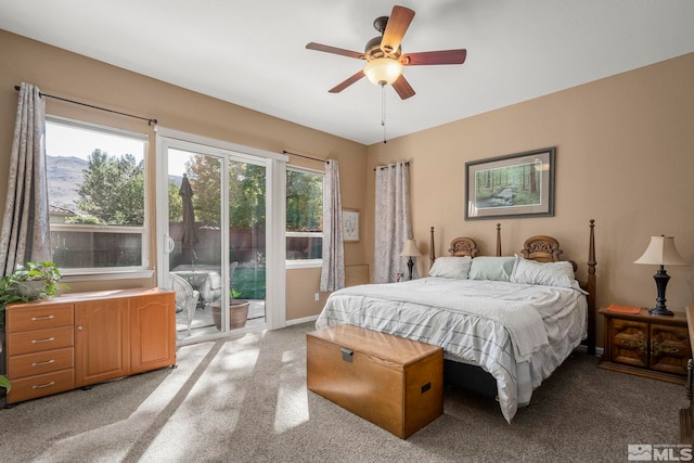 carpeted bedroom featuring access to outside and ceiling fan