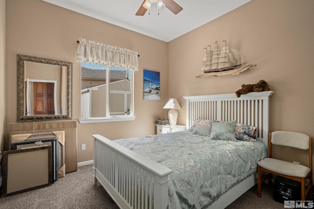 bedroom featuring ceiling fan and carpet floors