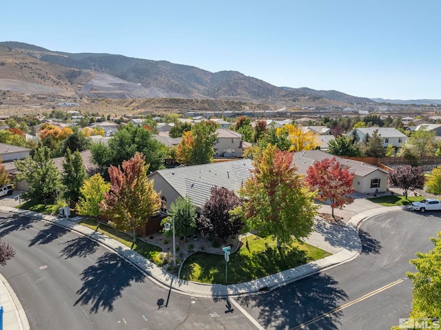 drone / aerial view featuring a mountain view