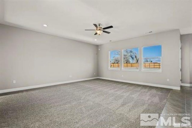 carpeted empty room with ceiling fan