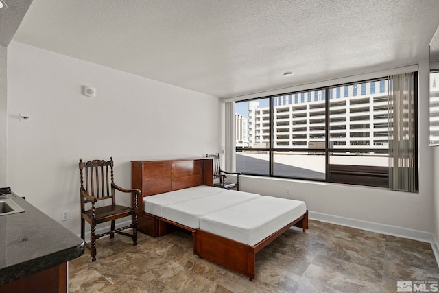 bedroom with a textured ceiling