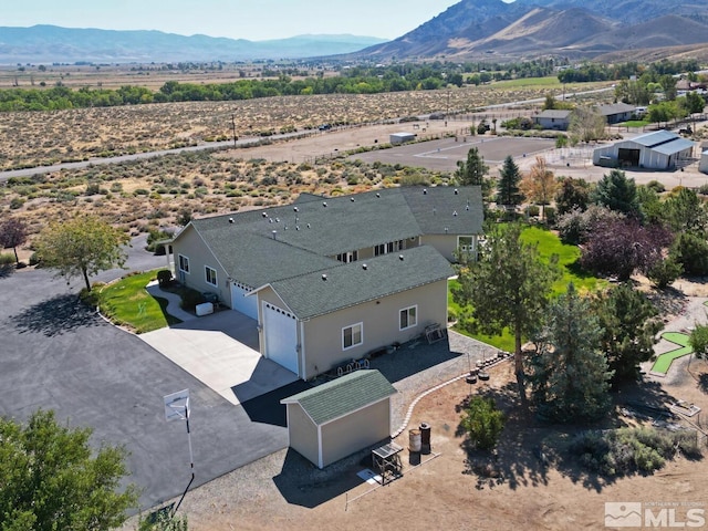 bird's eye view with a mountain view