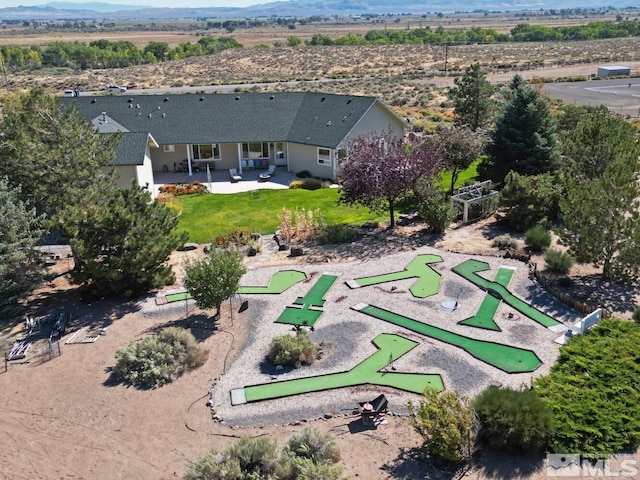 drone / aerial view featuring a mountain view