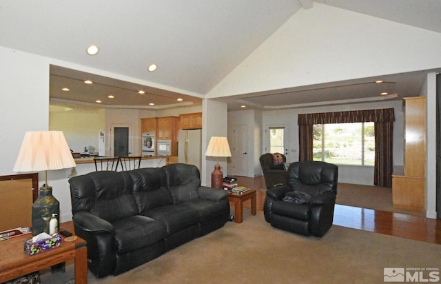 carpeted living room featuring high vaulted ceiling and beam ceiling