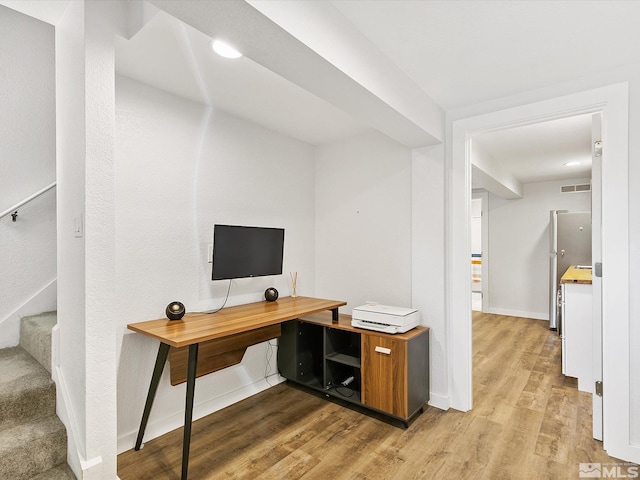 office space featuring light hardwood / wood-style flooring