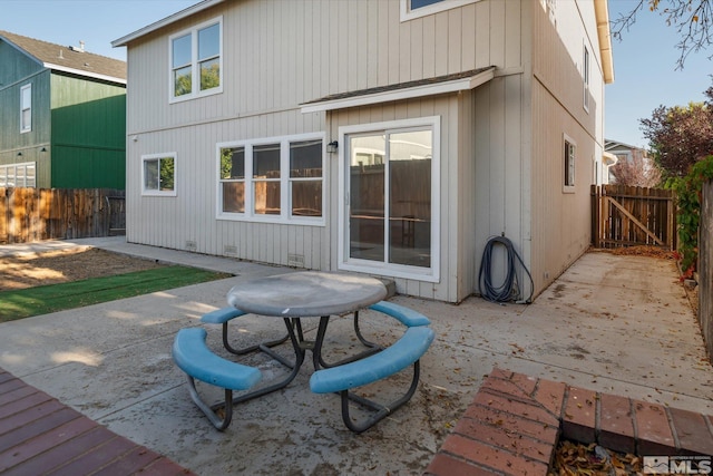 back of house featuring a patio