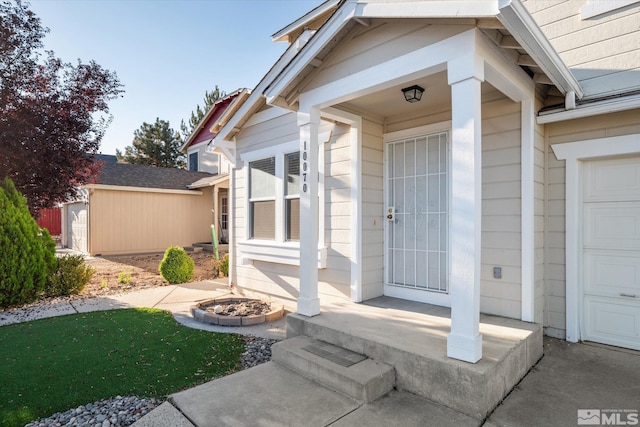 doorway to property featuring a garage