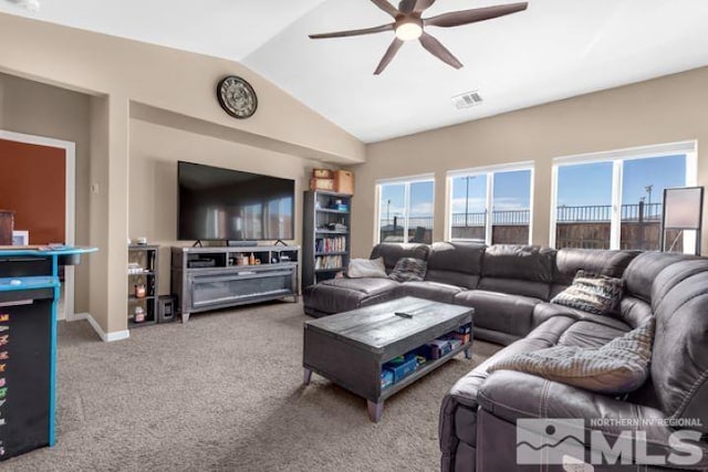 carpeted living room featuring vaulted ceiling and ceiling fan