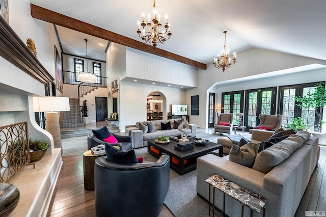 living room featuring a notable chandelier, beam ceiling, hardwood / wood-style floors, and high vaulted ceiling