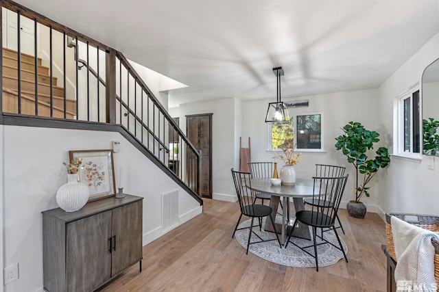 dining area featuring light hardwood / wood-style flooring