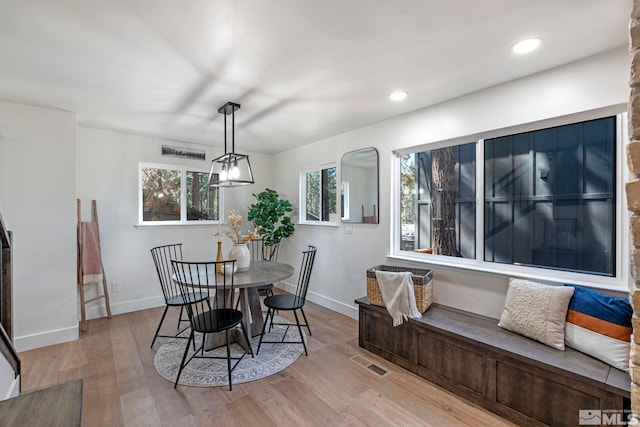 dining space featuring light hardwood / wood-style flooring