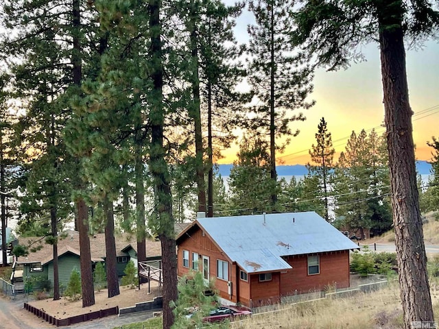 view of property exterior at dusk