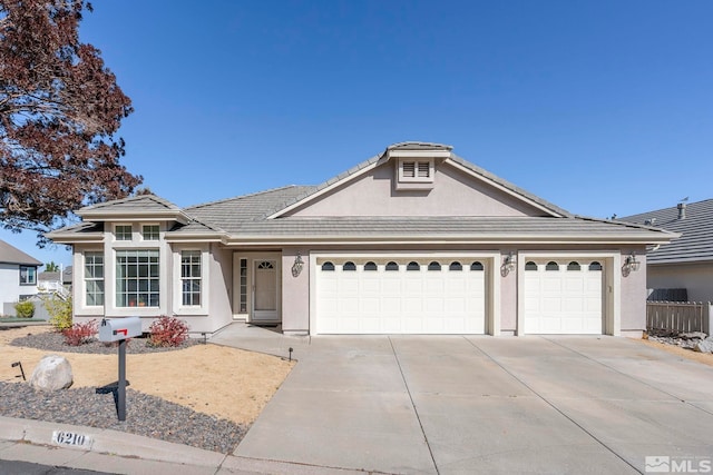 ranch-style house with a garage