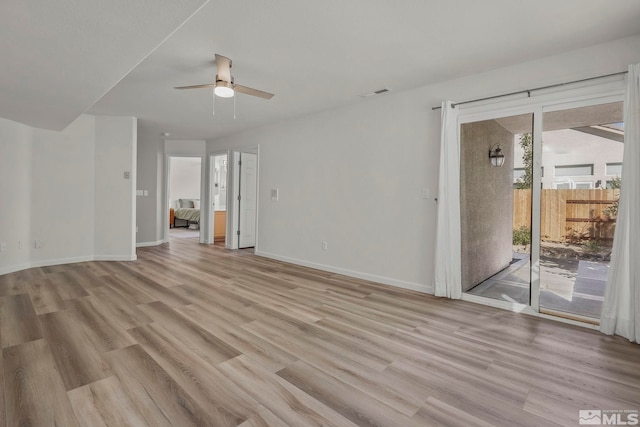 unfurnished room featuring ceiling fan and light wood-type flooring