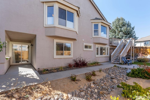 rear view of house with a patio