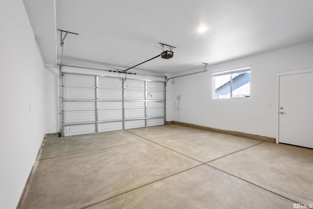 garage featuring a garage door opener