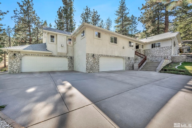 view of front of home with a garage