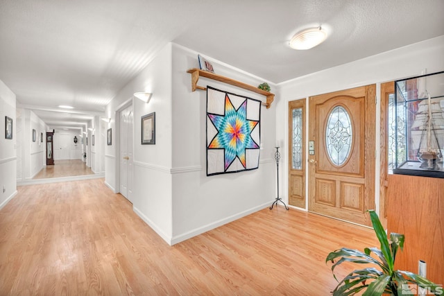 foyer featuring light hardwood / wood-style floors