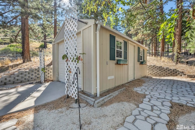 view of outbuilding with a garage