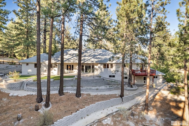 view of front of property featuring a deck