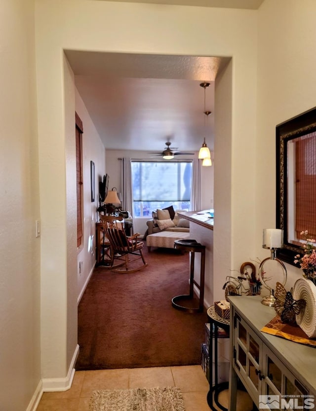 interior space featuring light colored carpet