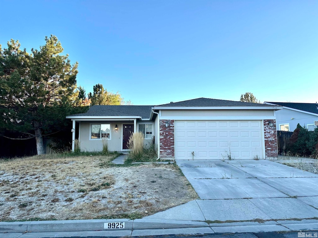 ranch-style house with a garage