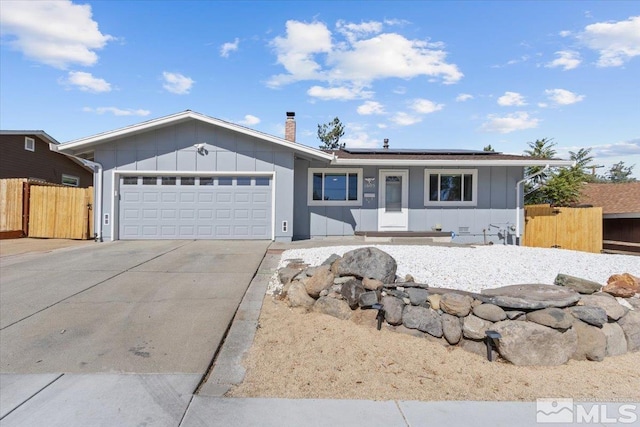 single story home with a garage