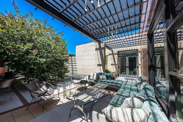 view of patio / terrace with a pergola and outdoor lounge area