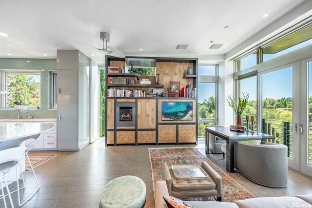 interior space featuring light wood-type flooring and ceiling fan