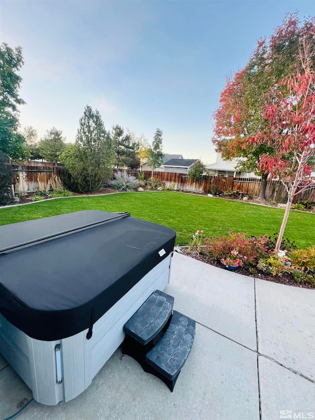 view of patio / terrace featuring a hot tub