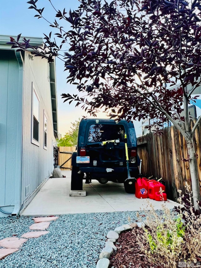 yard at dusk with a patio