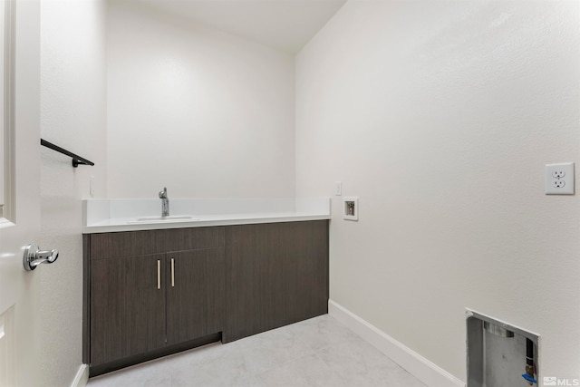 bathroom with vanity and tile patterned floors