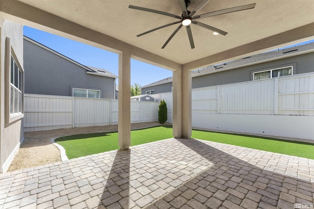 view of patio / terrace featuring a fenced backyard and ceiling fan