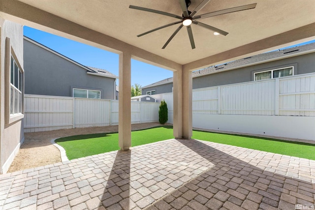 view of patio with ceiling fan