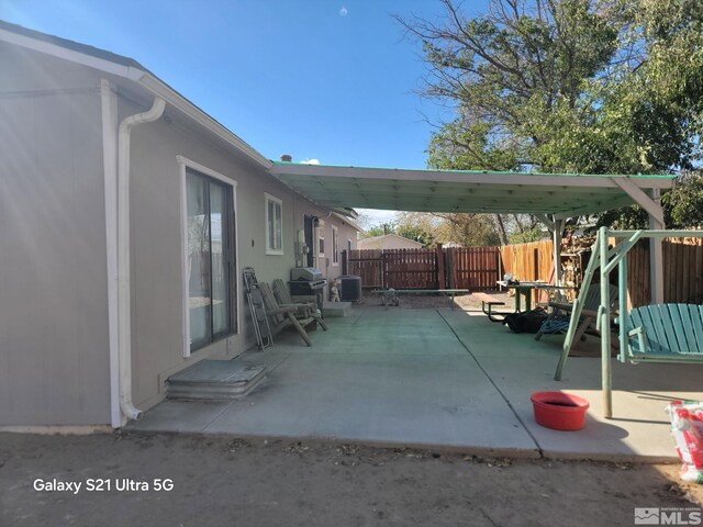 view of patio / terrace featuring a grill