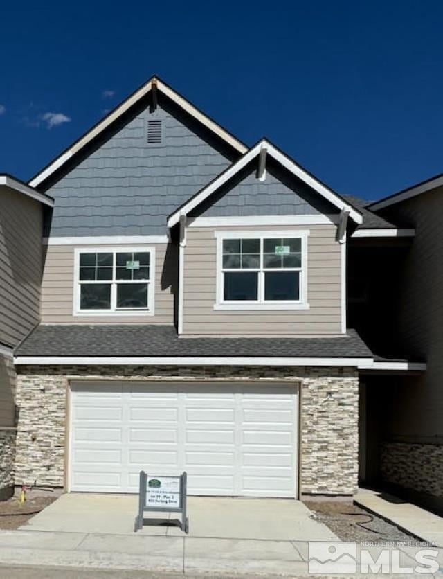 view of front of house with a garage