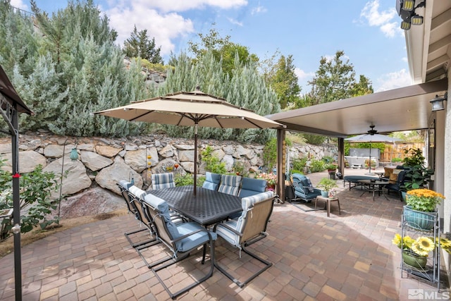 view of patio featuring ceiling fan and an outdoor hangout area