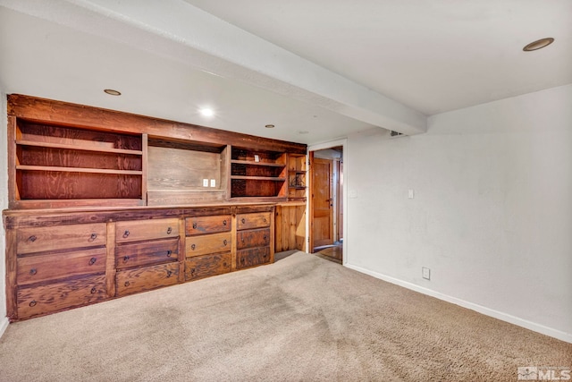 unfurnished living room featuring carpet floors