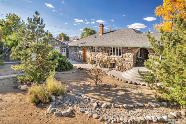 back of property featuring a patio area