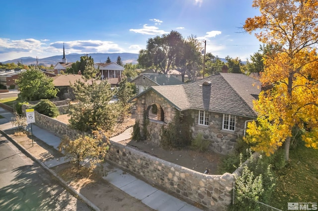 view of front of house featuring a mountain view