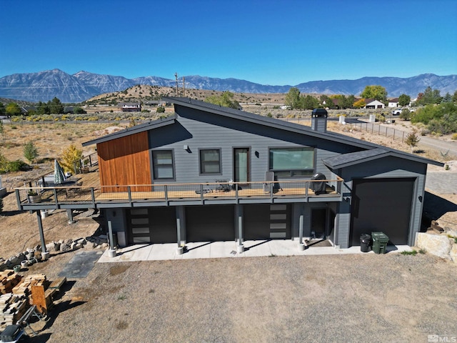 view of front facade featuring a mountain view